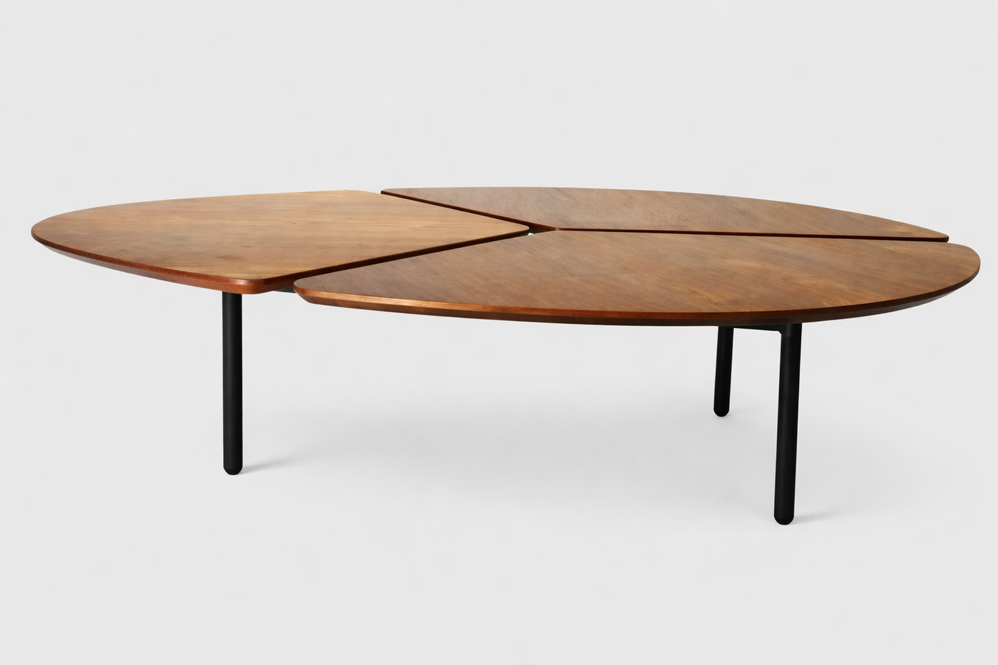 Wooden coffee table with black legs on a white background