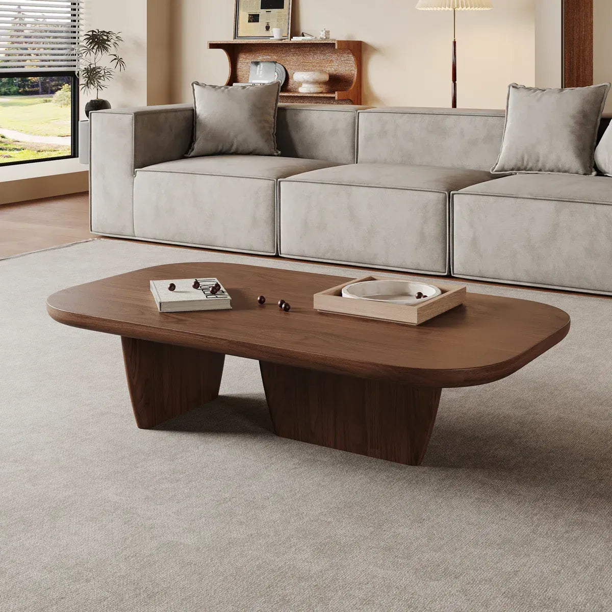 Rustic Modern living room with a gray sofa and wooden coffee table.