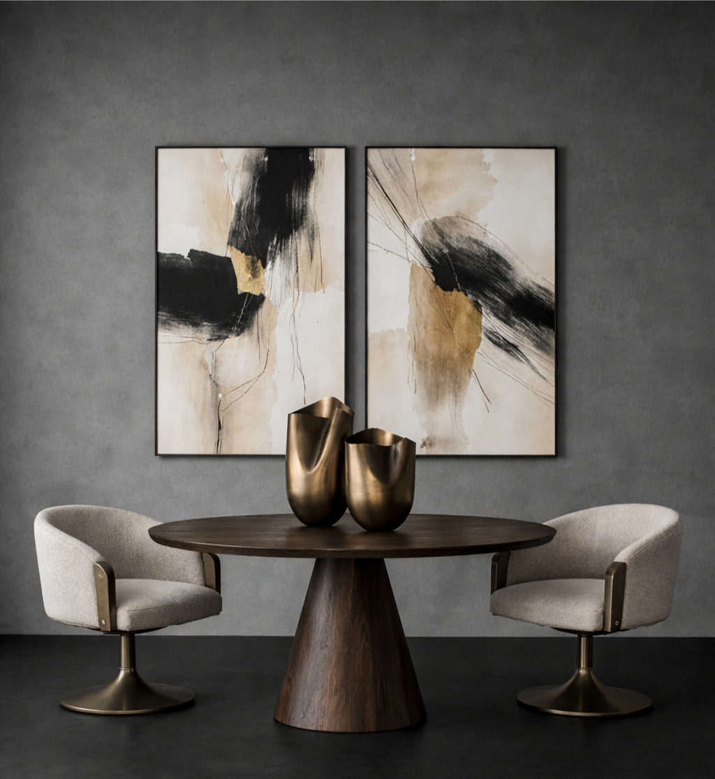 Modern dining room with abstract art, round wooden table, and chairs.