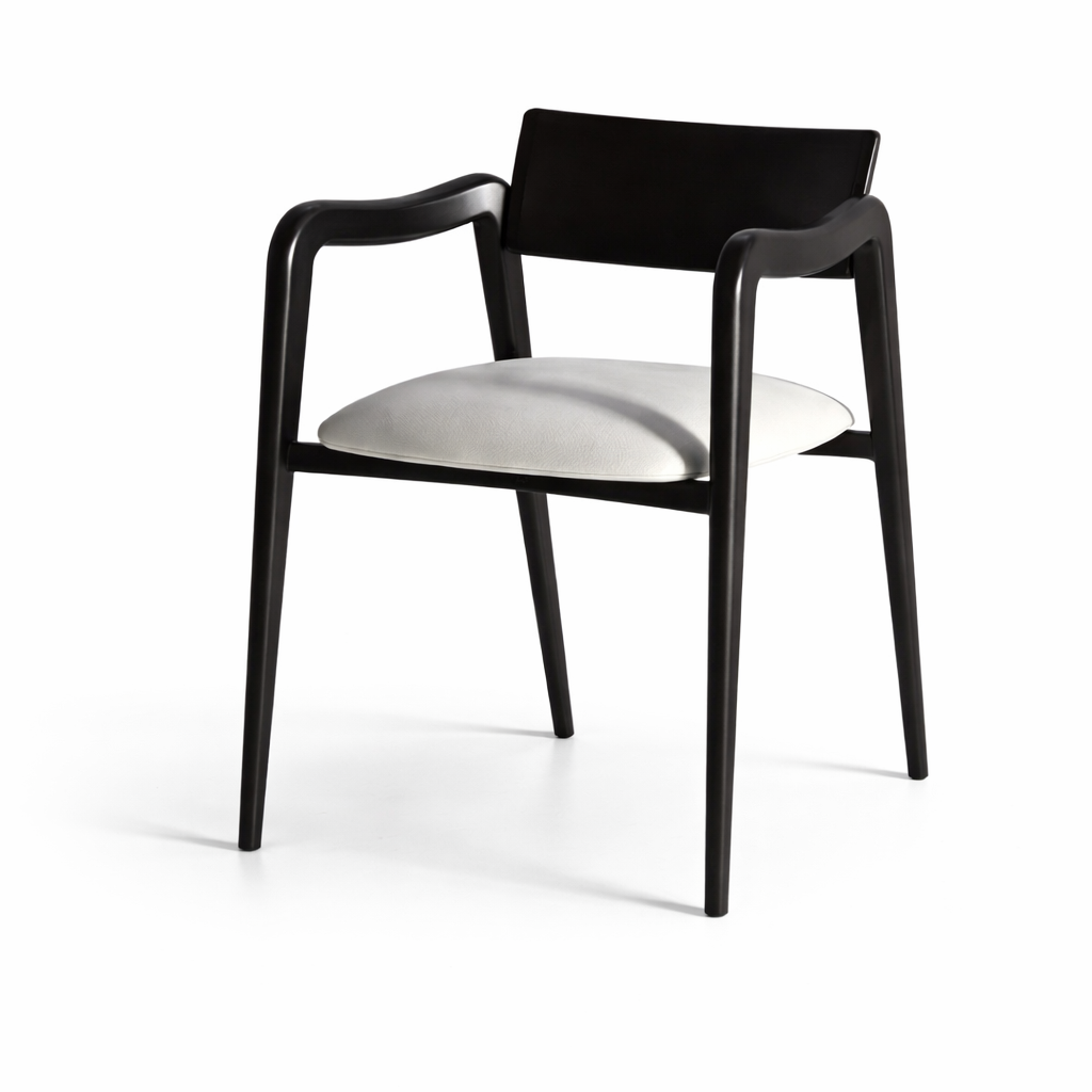 Black chair with a white cushion on a white background