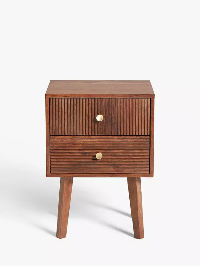 Its compact yet functional design provides just the right amount of space for your nighttime essentials