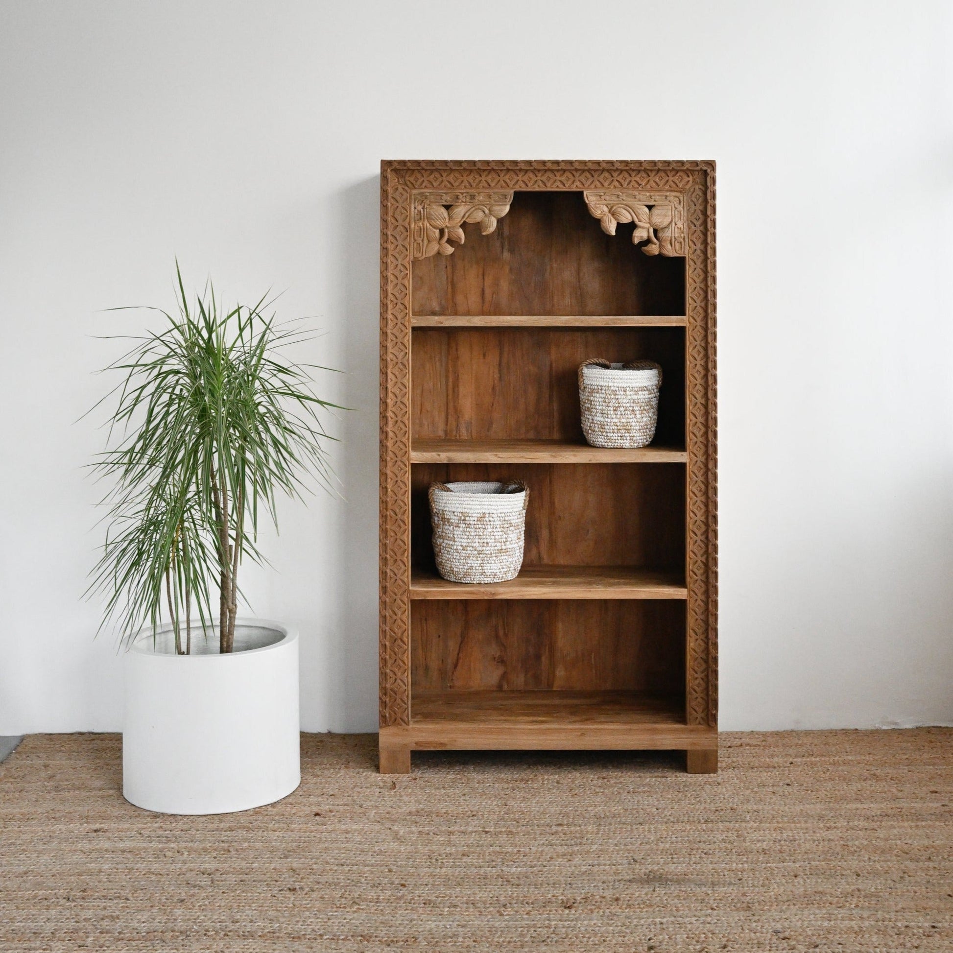 rustic carved wooden bookshelf for warm interior styling